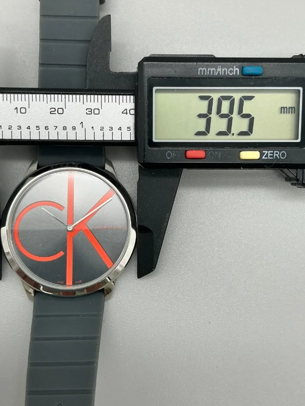 Calvin Klein Minimal Unisex 40mm Silver Tone Black Red Dial Stainless Steel Case
